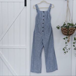 Pinstriped wide leg cotton button front open back jumpsuit overalls.